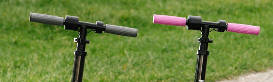 Adjustable handlebars on Kubbi kids electric scooters in black and pink