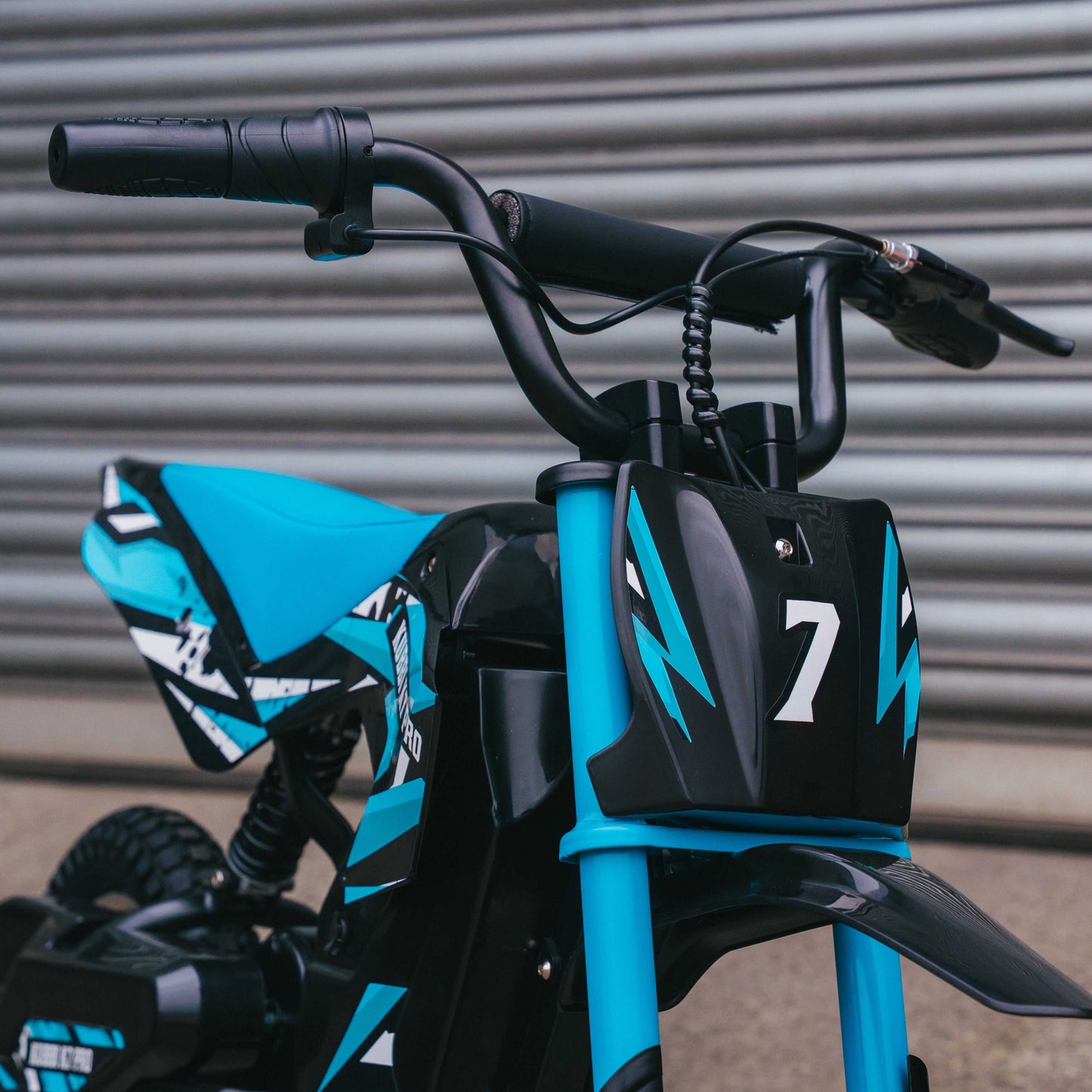 Kubbi K7 Pro Dirt Bike for kids aged 6-10 with 300W motor and adjustable speed modes