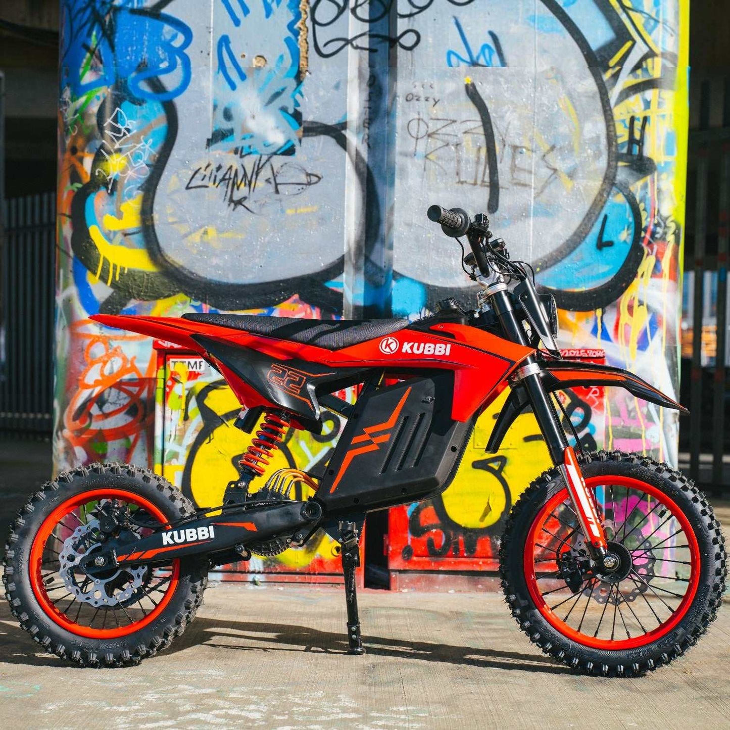 Kubbi K22 Electric Dirt Bike for teenagers riding off-road on dirt trail