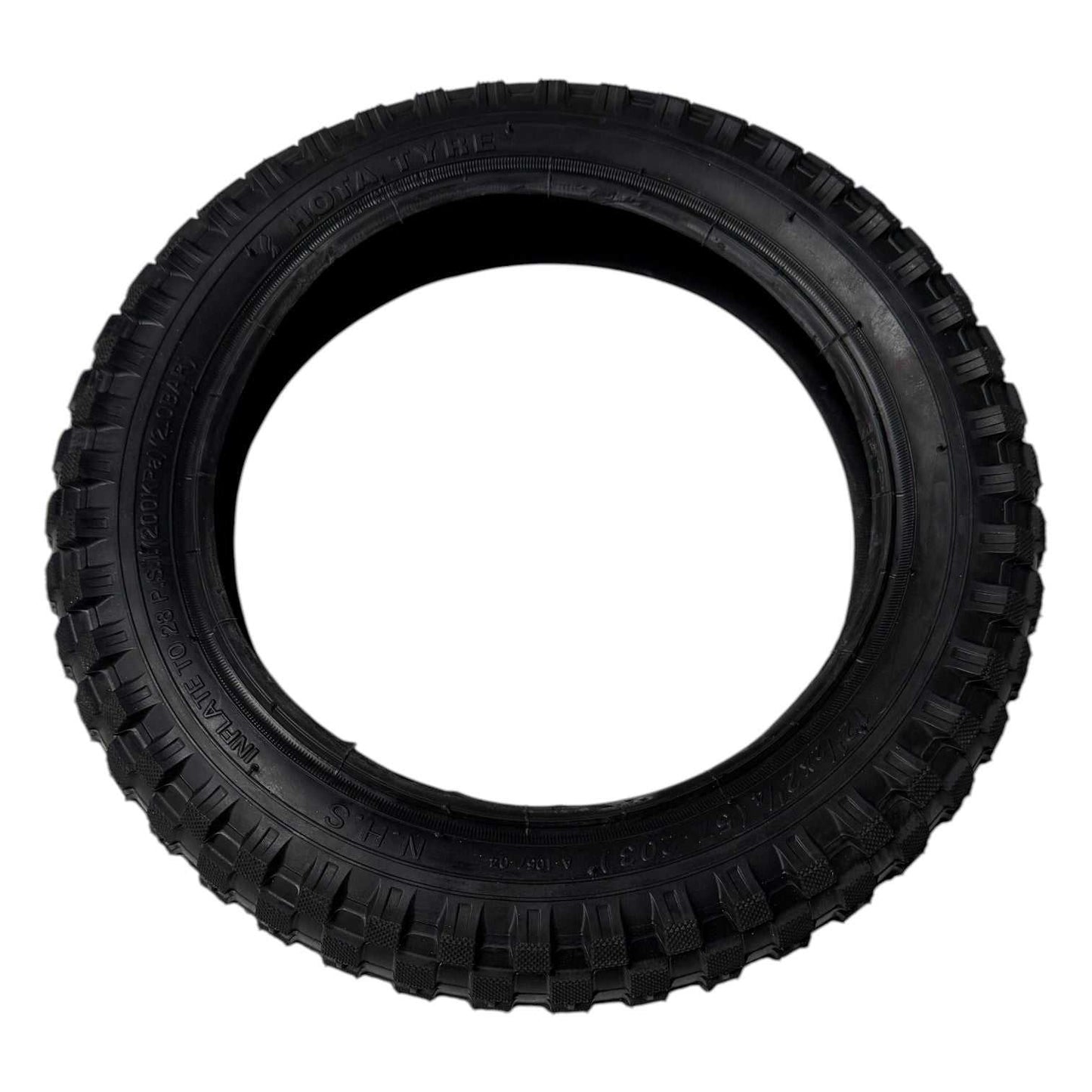 Kubbi K4 tyre tread close-up on black tire