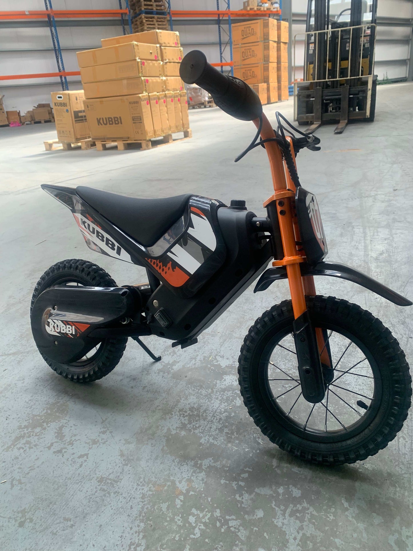 Orange Kubbi Mini Electric Dirt Bike brand new unused warehouse deal