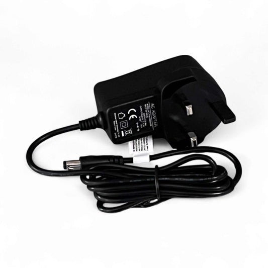 Kubbi S9 Pro charger with UK plug and attached power cable against white background