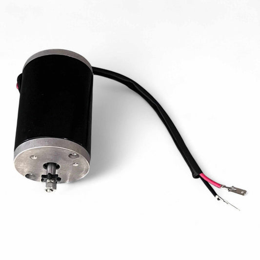 Mini motor with black casing and connected wires isolated on white background