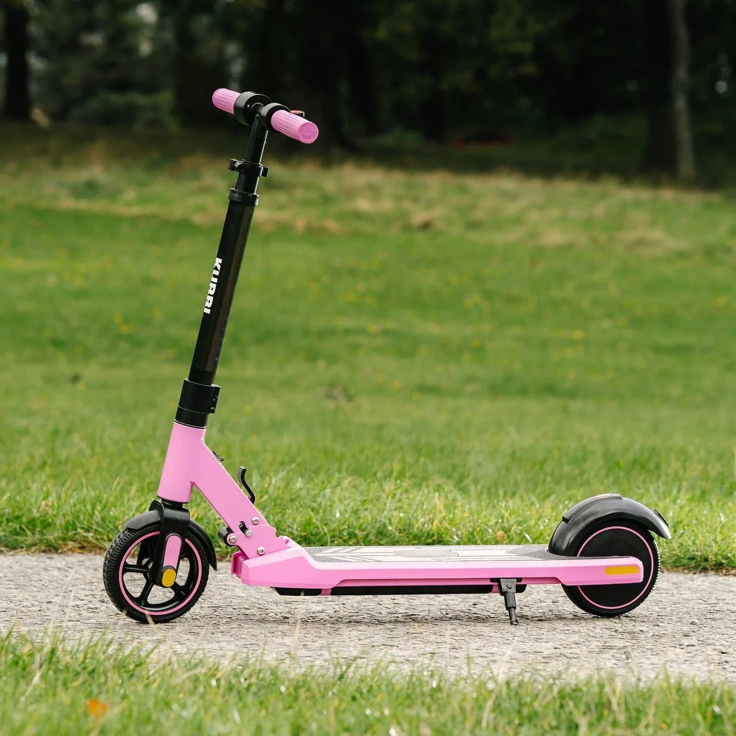 Kubbi S9 Pro pink kids electric scooter with adjustable handlebar and safety features on pavement