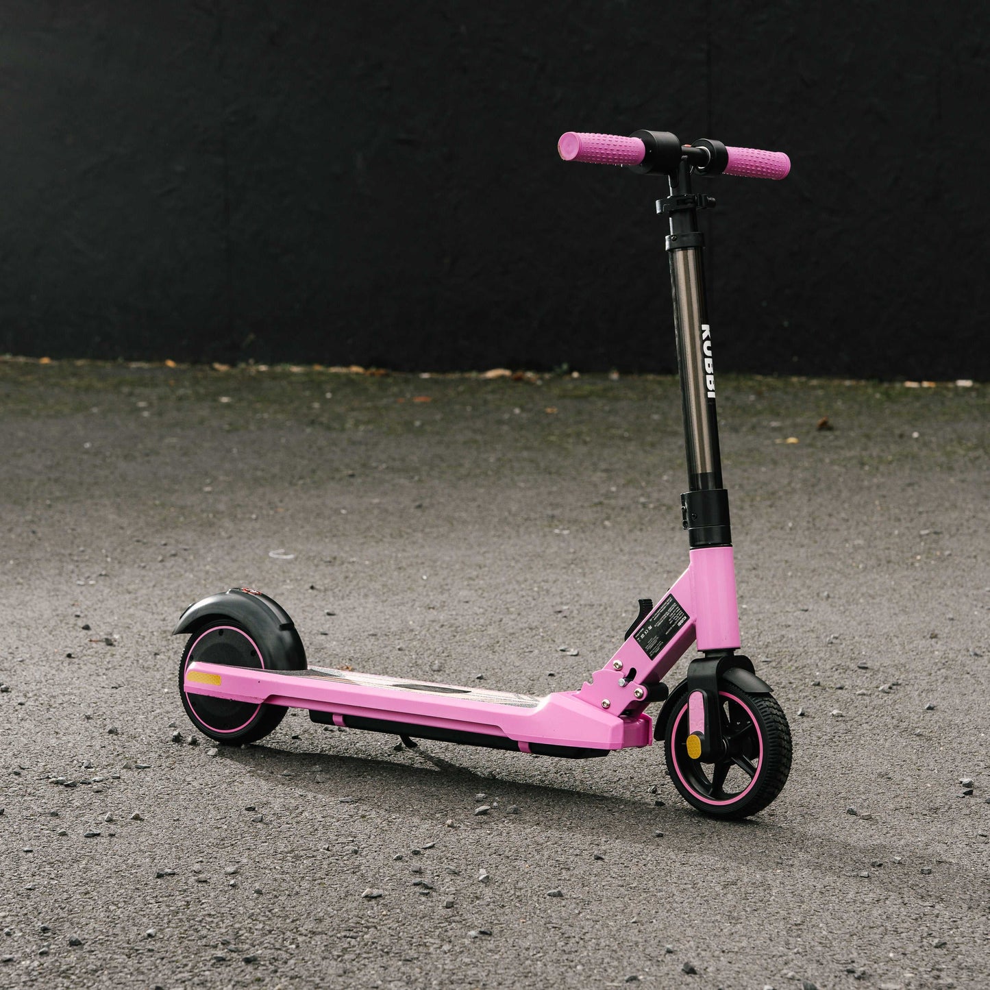 Kubbi S9 Pro pink electric scooter with sturdy design and ergonomic handlebars on pavement