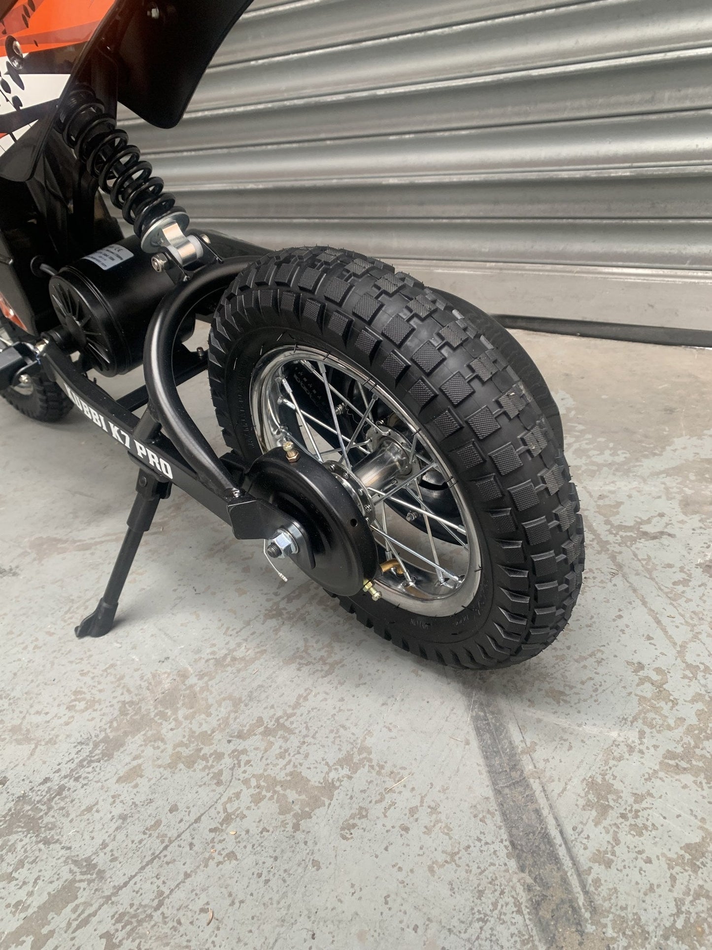Kubbi K7 Pro orange electric dirt bike as new warehouse deal