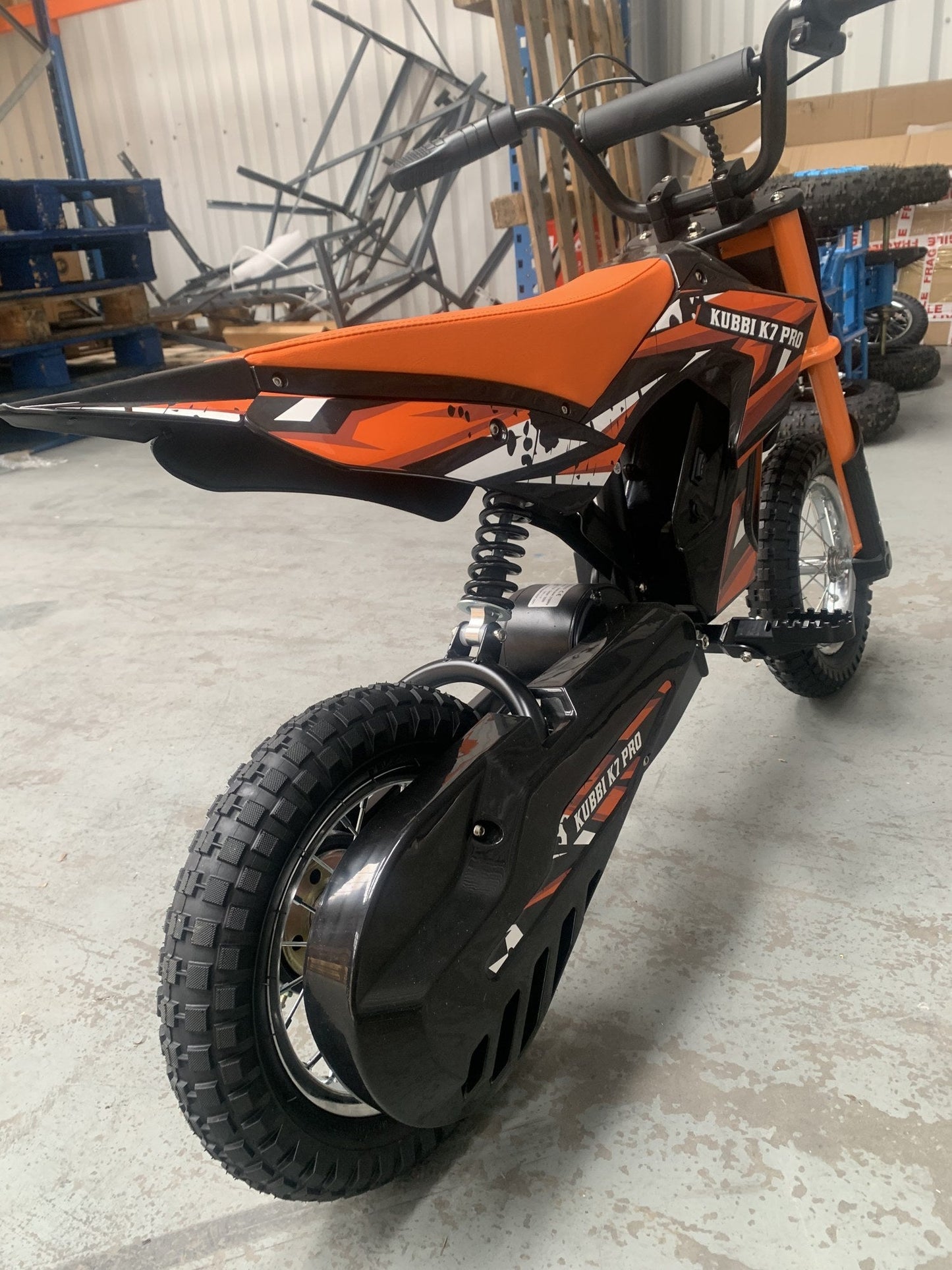 Kubbi K7 Pro orange electric dirt bike for kids in as-new condition warehouse deal